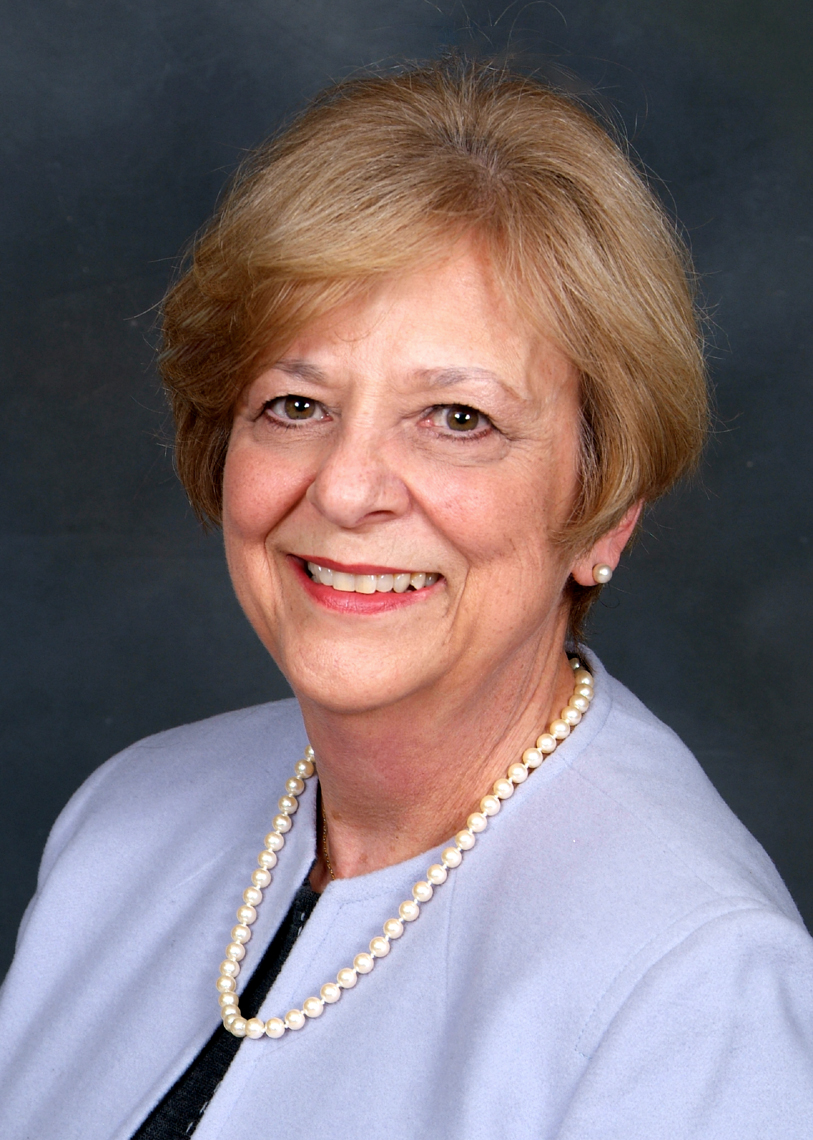 Portrait of Kathryn K. Peppe, smiling.