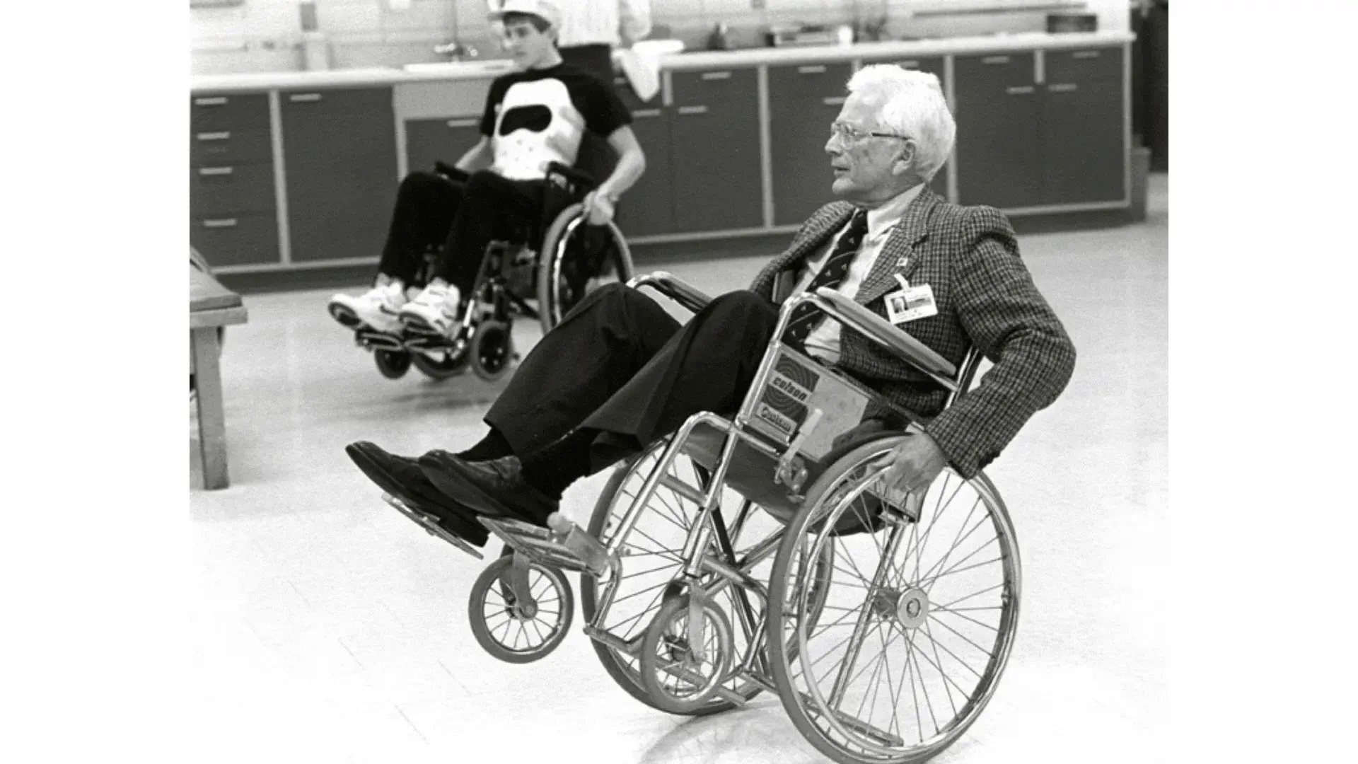 Ernest Johnson in a wheelchair at an event