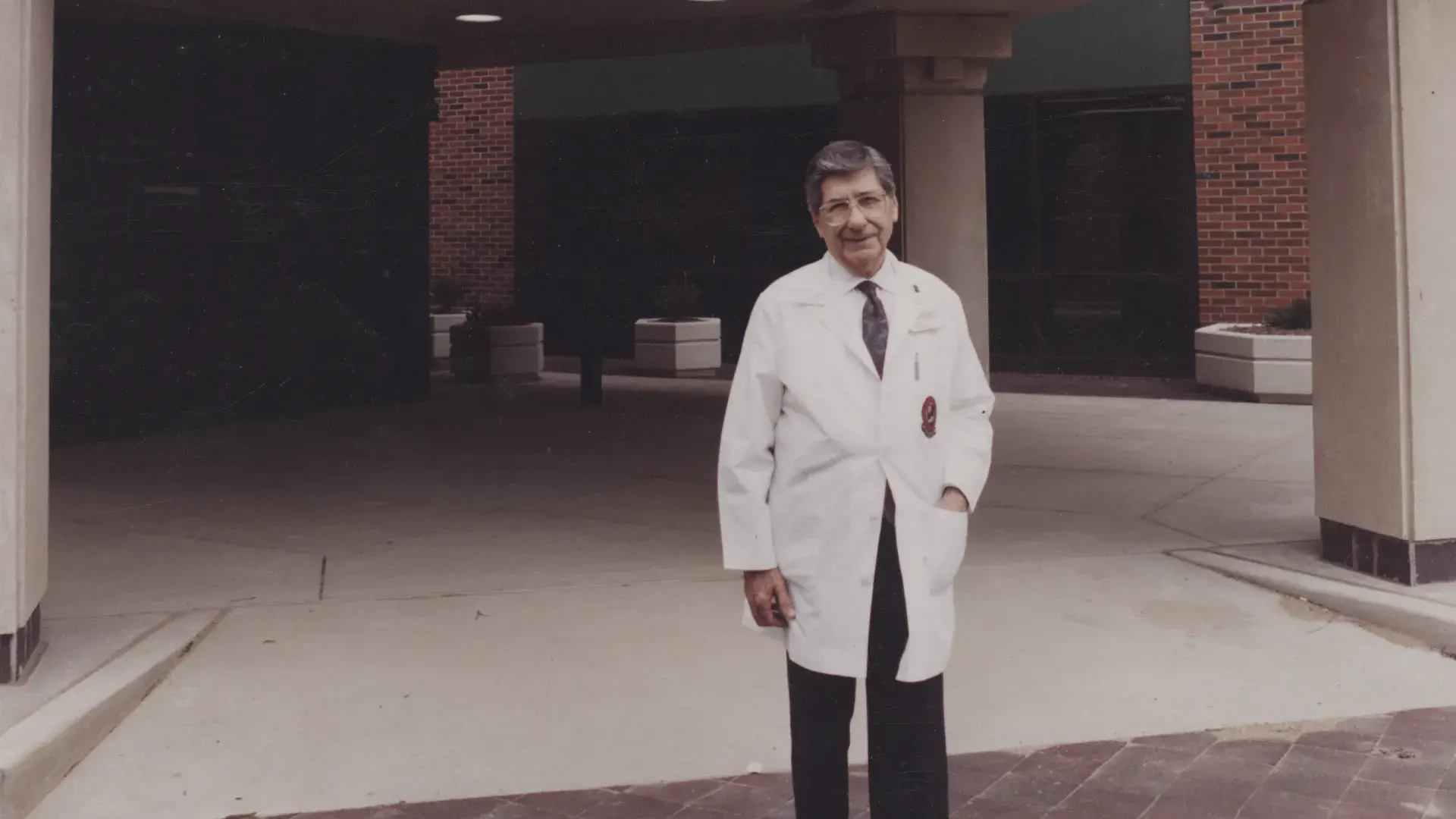 Arthur G. James standing in front of The James Cancer Hospital in a Medical Heritage Center archival image