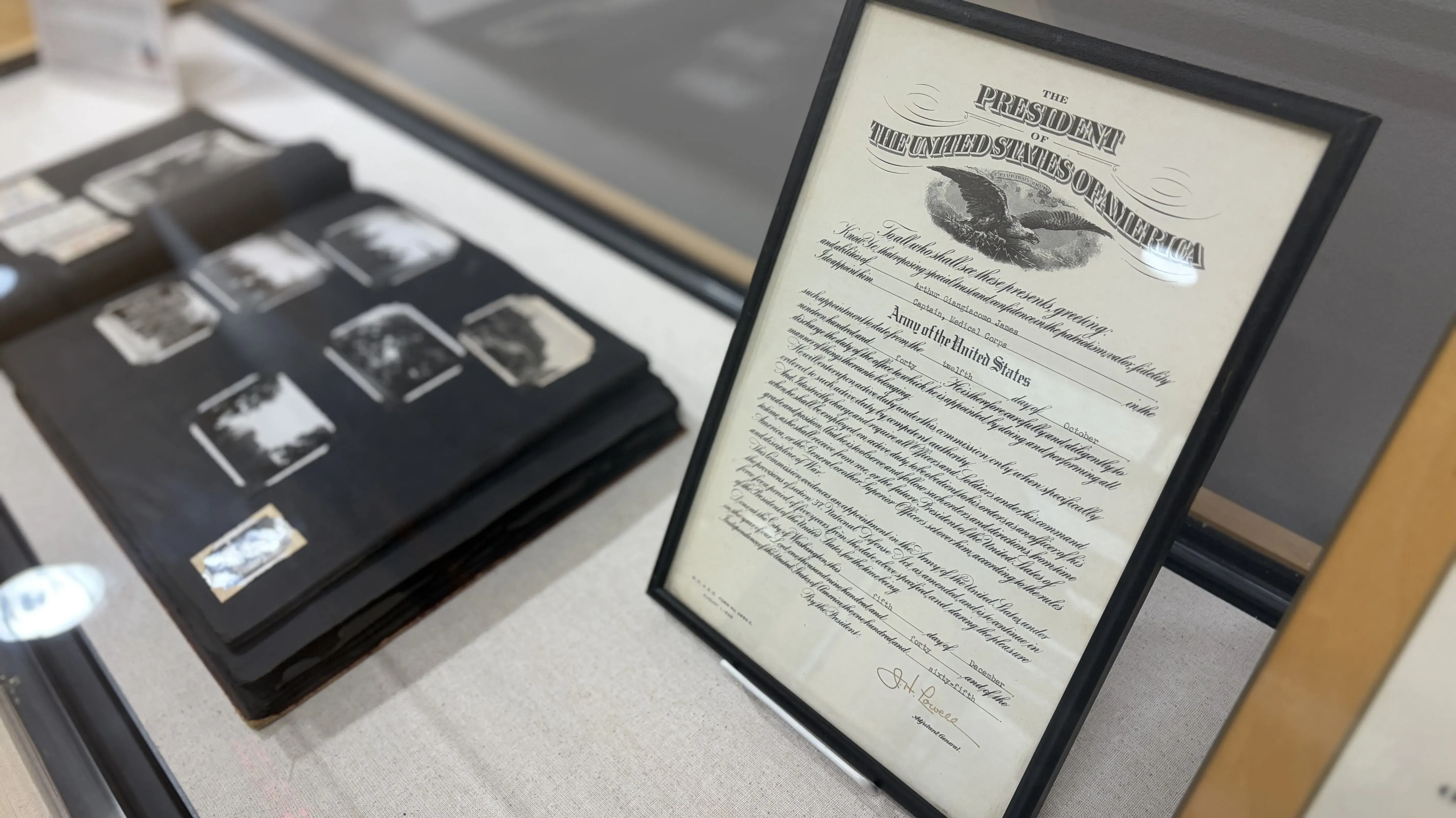Signed letter from adjutant general, alongside photos of medicine in military history.