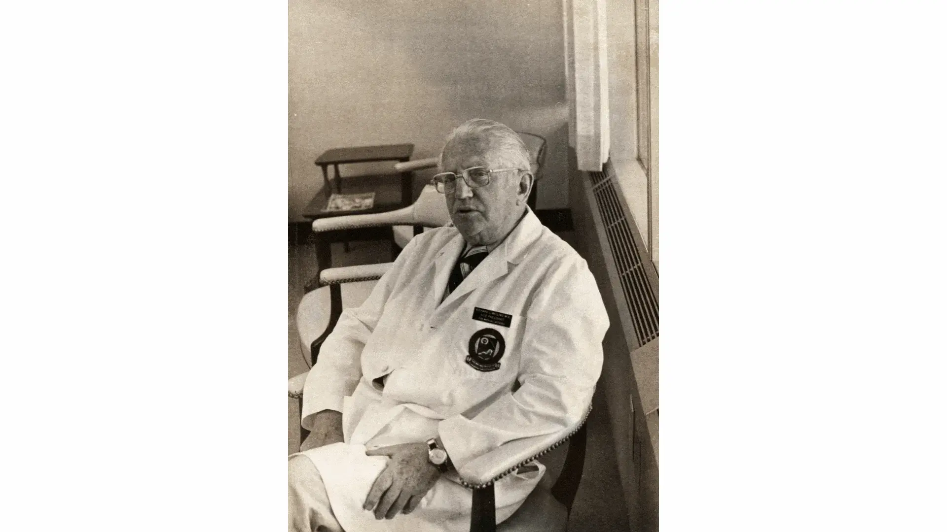 Ernest Johnson in his later years, wearing a lab coat