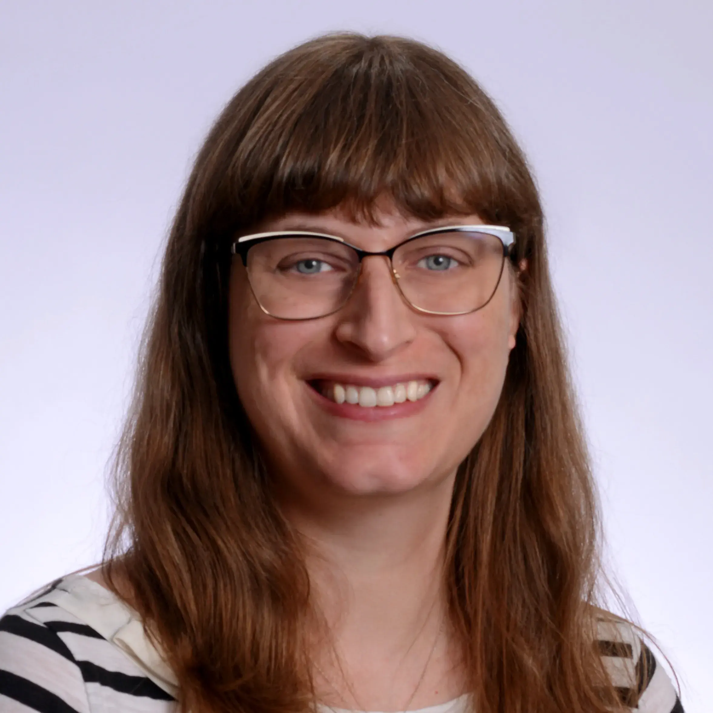 Headshot of Anna Biszaha, smiling.